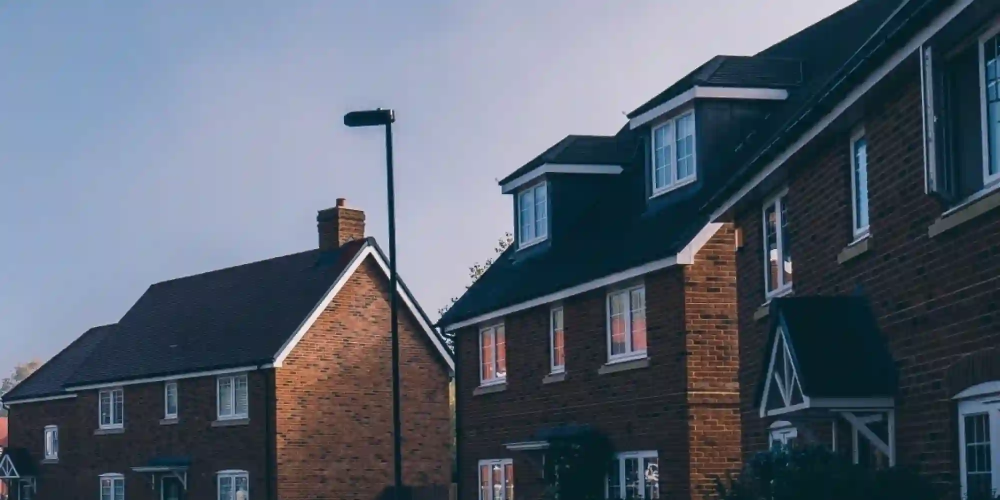 masonry building with brick facade, wooden floors and timber roof structure